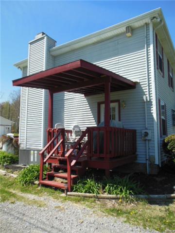 180 Batson Road Cunningham, TN 37052 - Photo 18 of 20 COVERED SIDE DECK