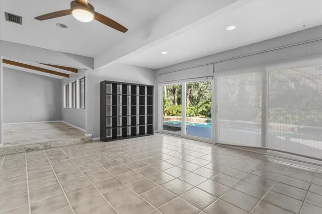 a view of an empty room and window