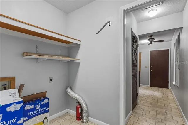 a view of a hallway with workspace