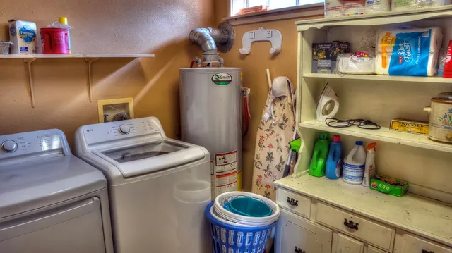 a utility room with dryer and washer