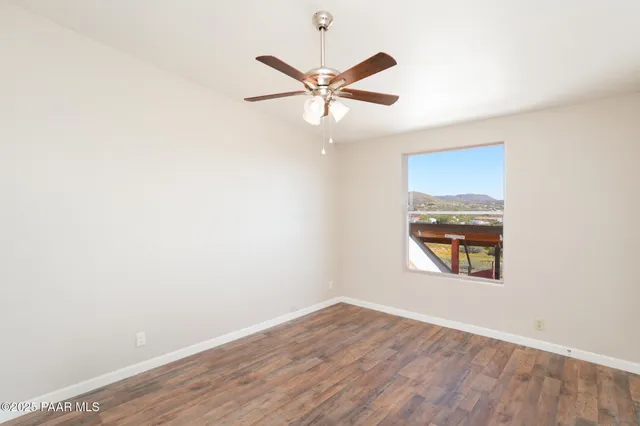 a view of a kitchen from the hallway