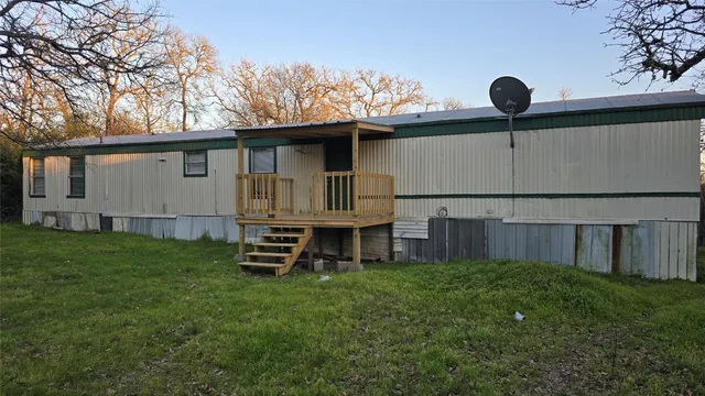 a view of a backyard with a garden