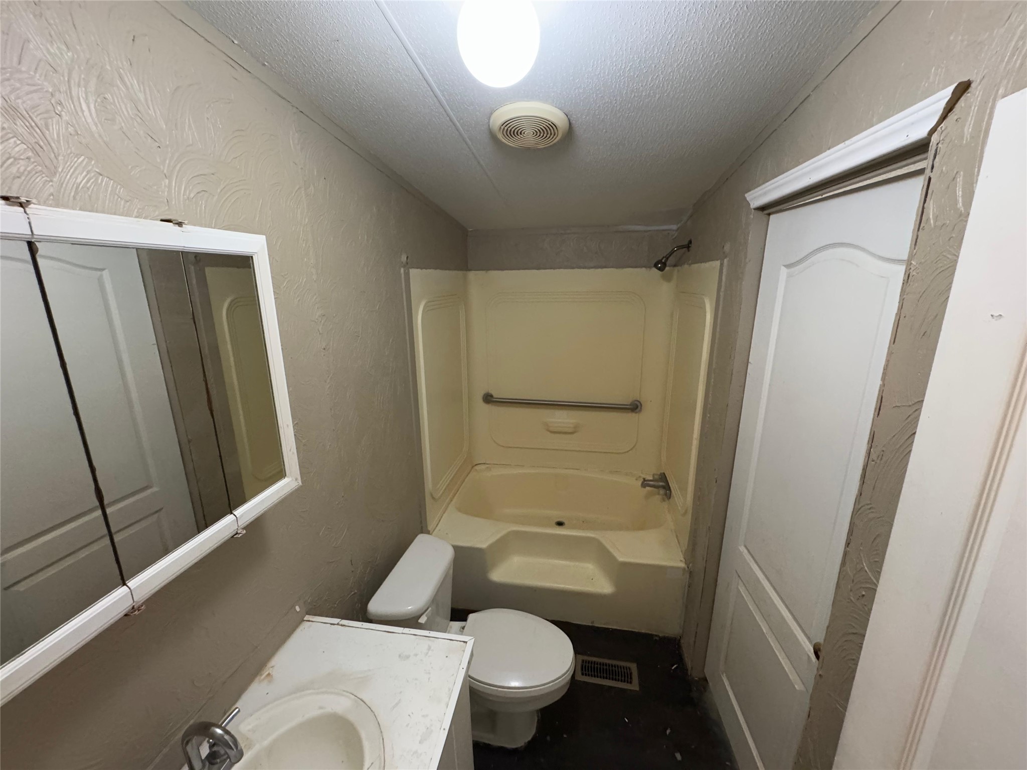 8315 Burleson Manor Road, Unit B Manor, TX 78653 - Photo 9 of 15 a bathroom with a toilet and a shower