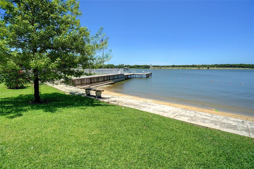 261 Timberlake Drive Azle, TX 76020 - Photo 31 of 32 Beachfront with view of fishing pier.
