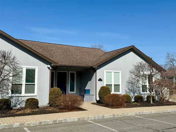 a view of a house with a patio