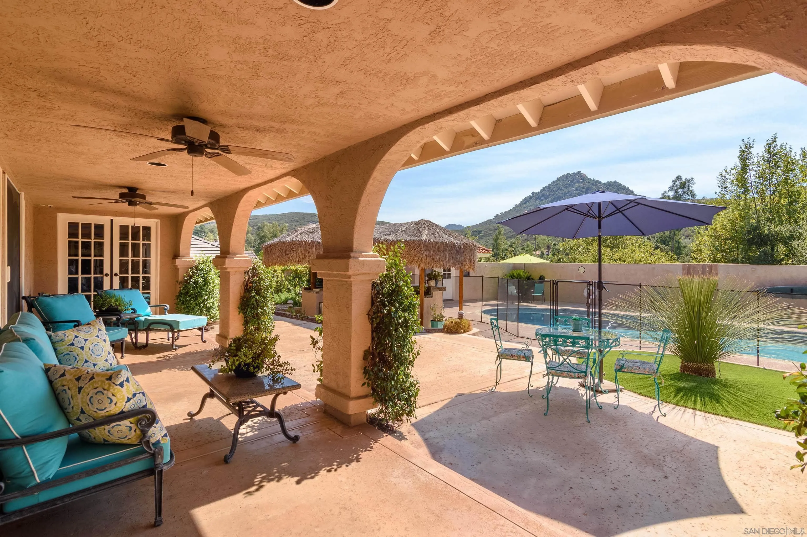 23949 Barona Mesa Road Ramona, CA 92065 - Photo 26 of 35 a view of a patio with a table and chairs