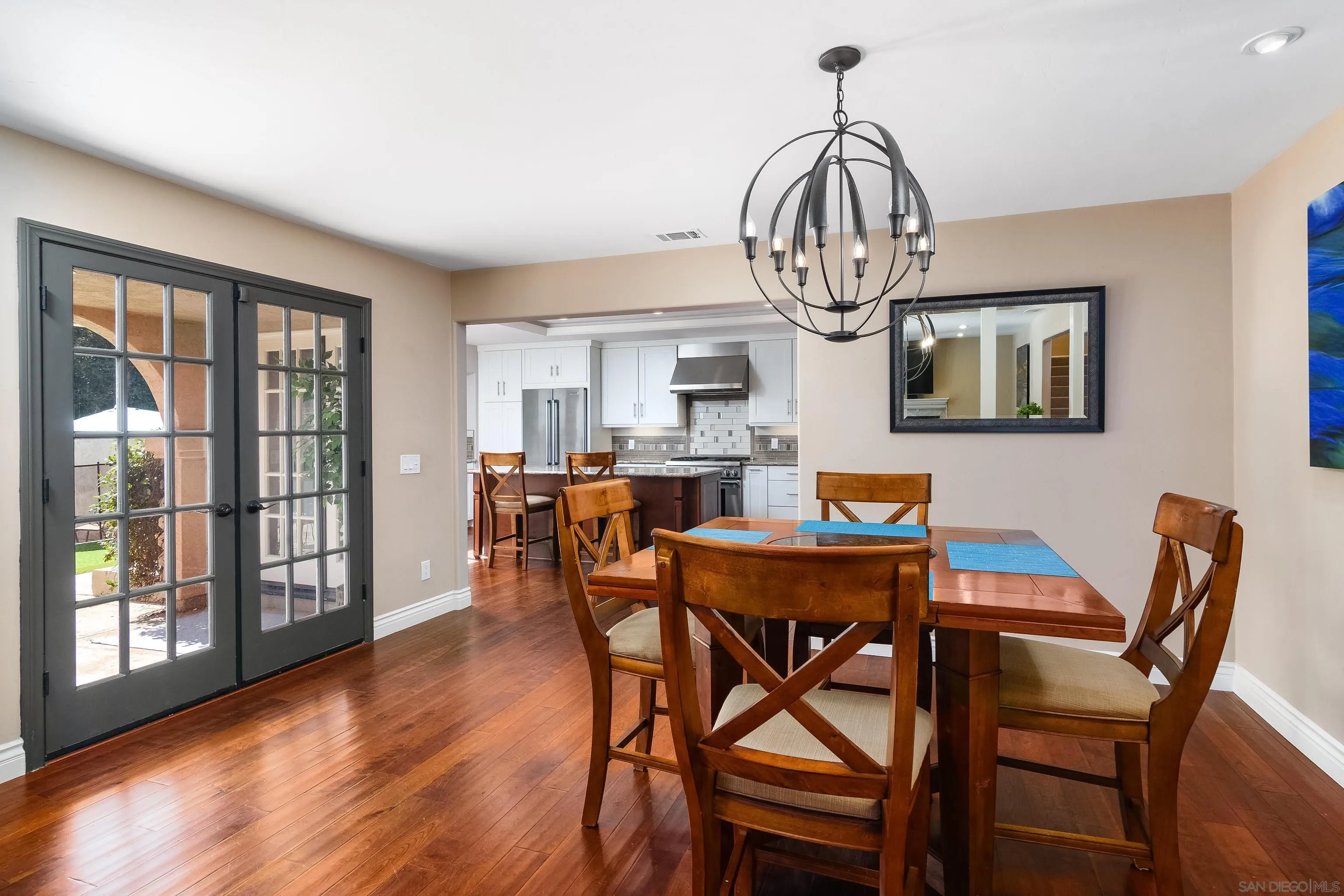 23949 Barona Mesa Road Ramona, CA 92065 - Photo 7 of 35 a view of a dining room with furniture window and wooden floor