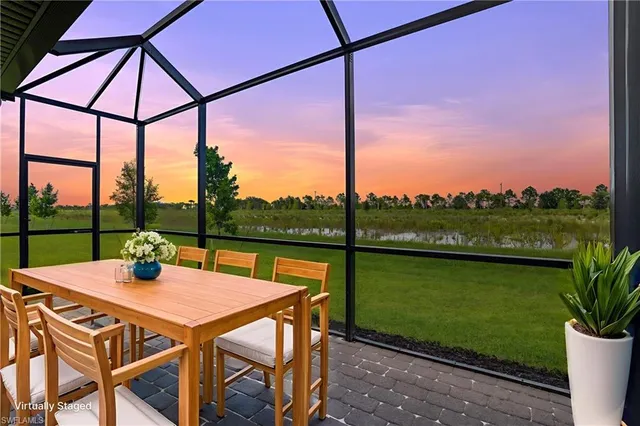 a view of an outdoor sitting area with a lake view