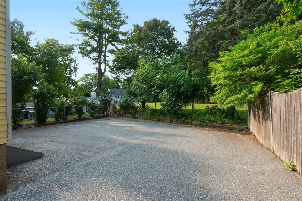 21 Goodell Street, Unit 1 Salem, MA 01970 - Photo 15 of 19 a view of a field with trees in the background