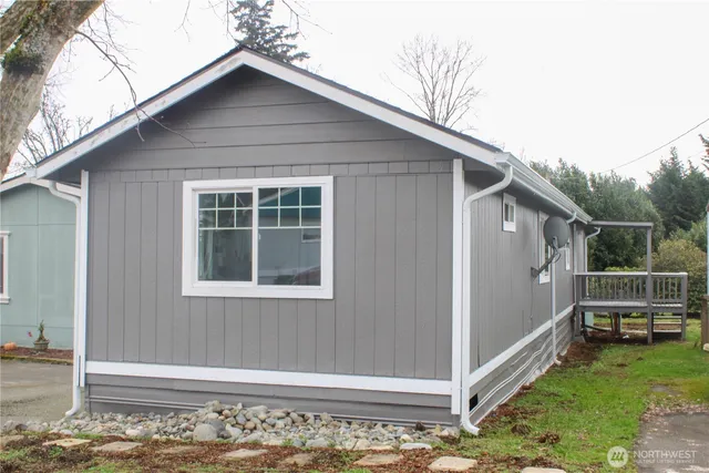 a kitchen with cabinets stainless steel appliances and a sink