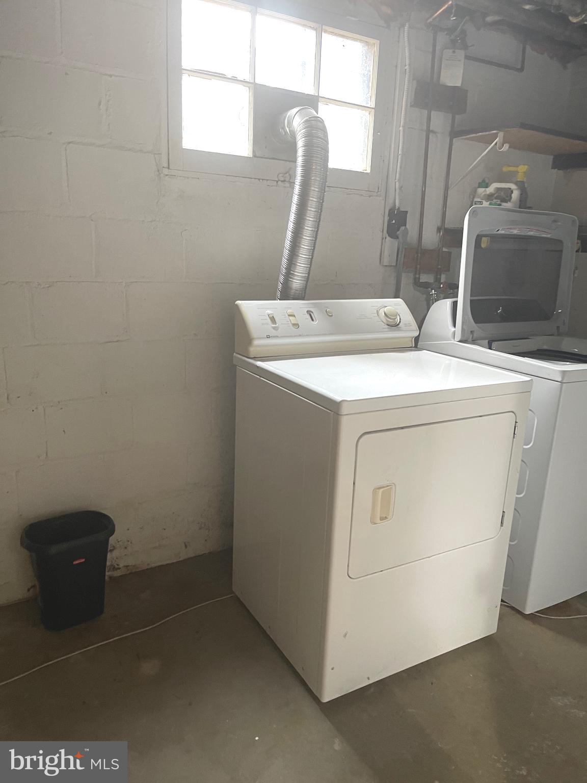 9803 Forest Grove Drive Silver Spring, MD 20902 - Photo 24 of 24 a utility room with dryer and washer