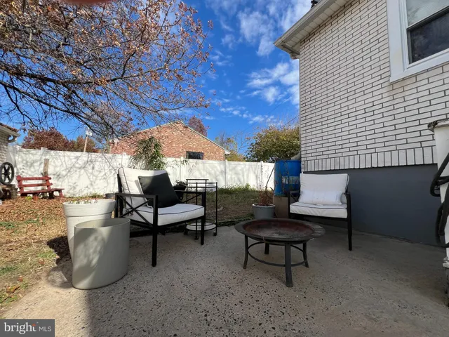 a building outdoor space with patio furniture