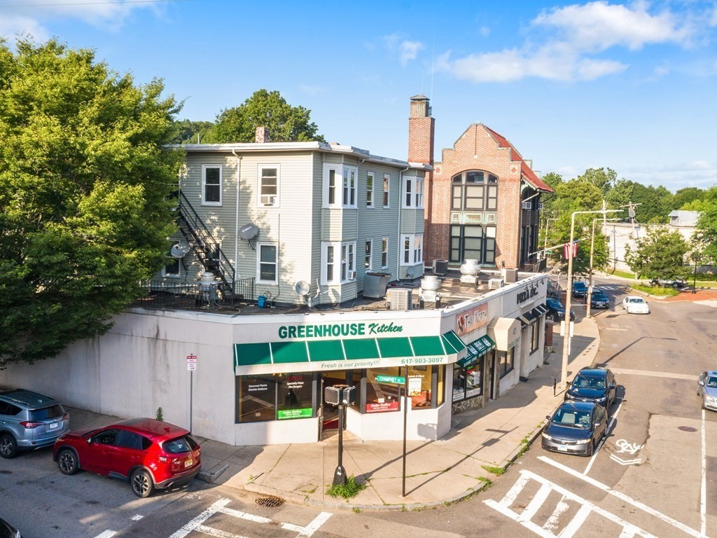 427-435 Faneuil Street, Unit R4 Boston, MA 02135 - Photo 17 of 18 a front view of a house with garden