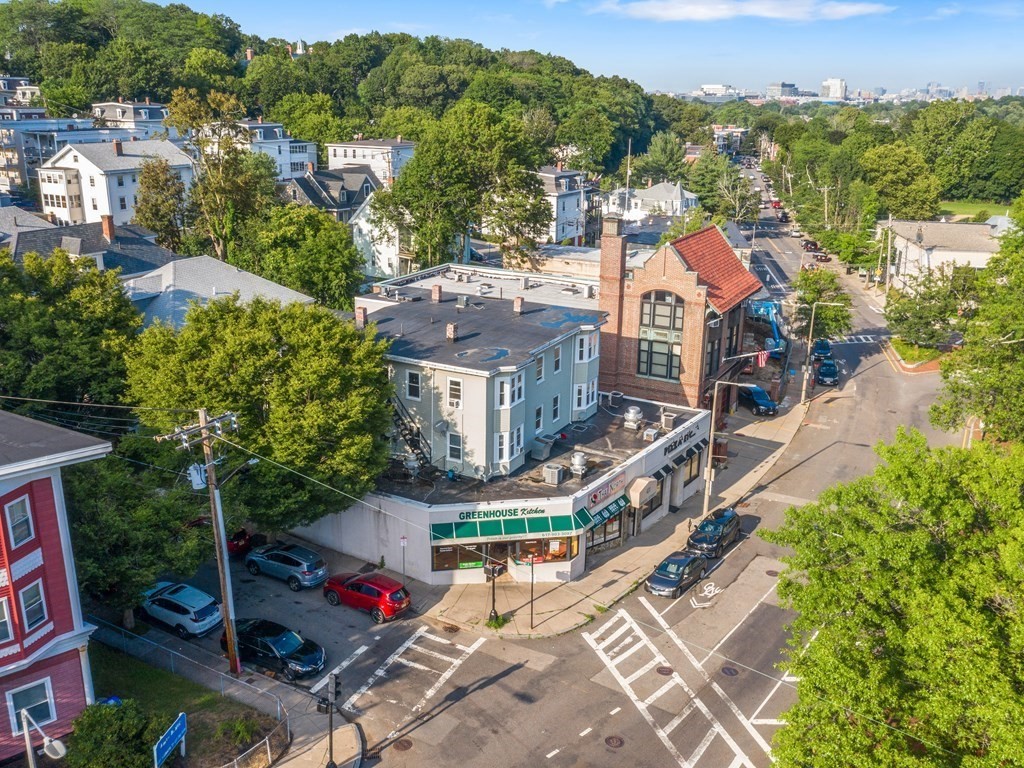 427-435 Faneuil Street, Unit R4 Boston, MA 02135 - Photo 18 of 18 an aerial view of a house with a garden