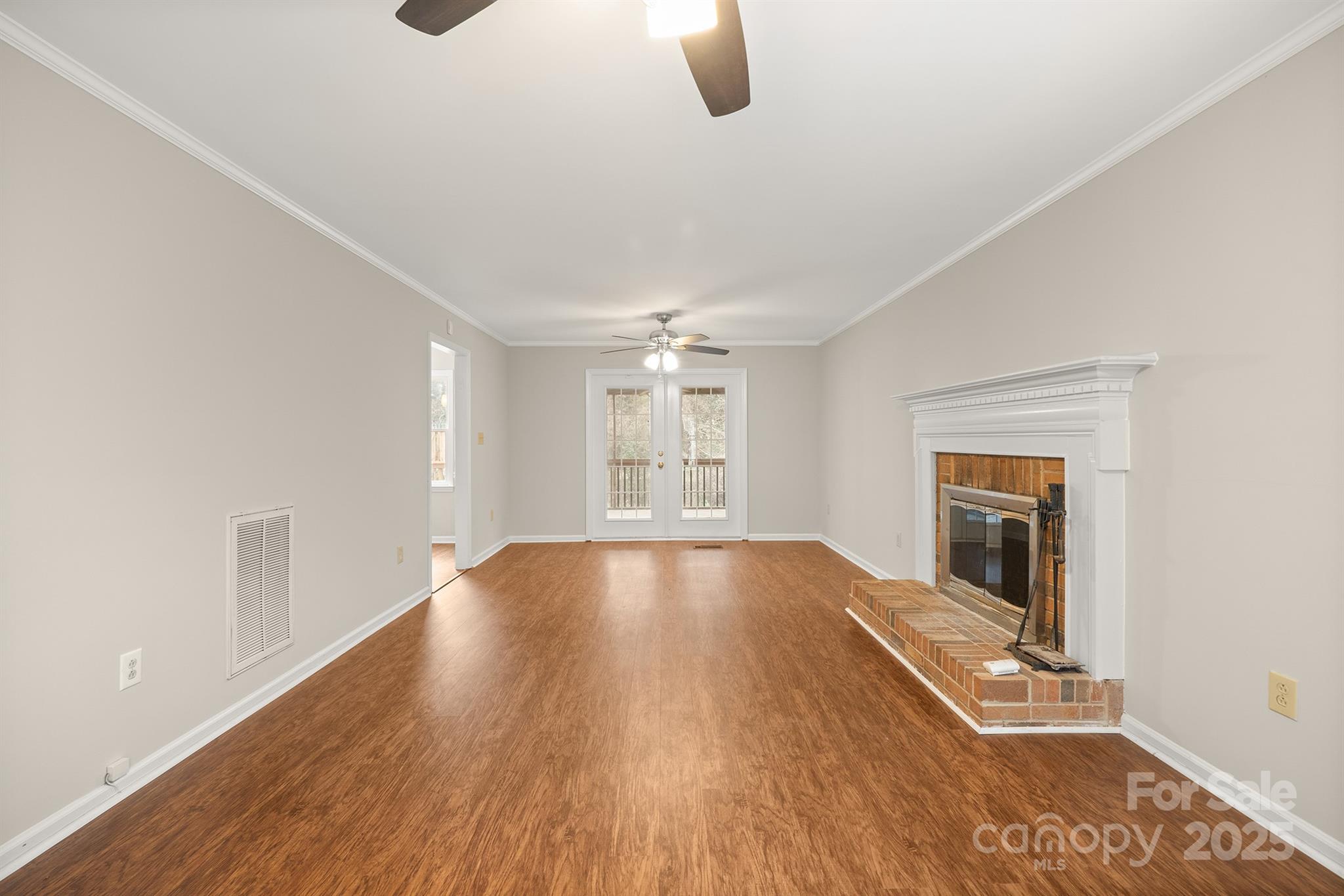 8730 Rittenhouse Circle Charlotte, NC 28270 - Photo 13 of 48 wooden floor in an empty room with a window