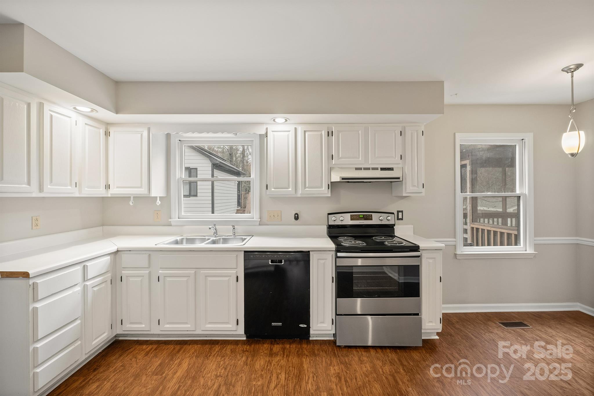 8730 Rittenhouse Circle Charlotte, NC 28270 - Photo 15 of 48 a kitchen with a stove oven and sink