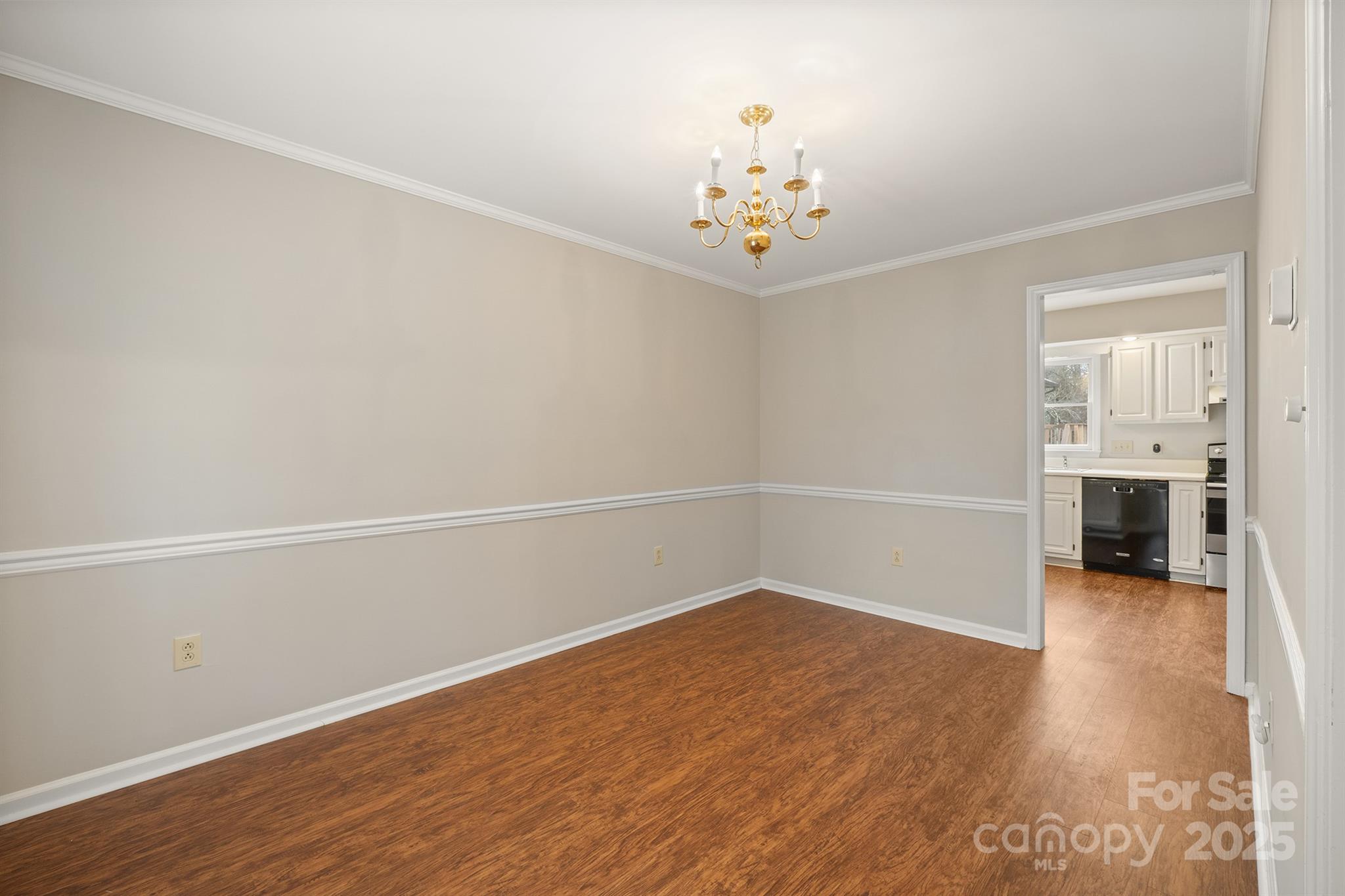 8730 Rittenhouse Circle Charlotte, NC 28270 - Photo 20 of 48 wooden floor in an empty room with a window
