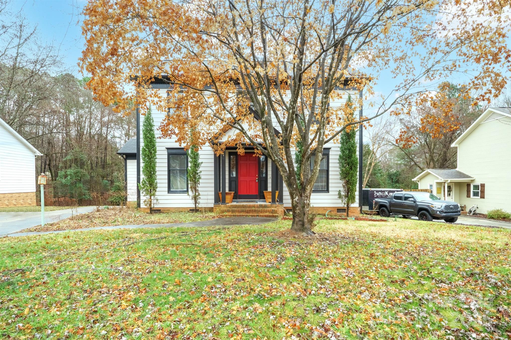 8730 Rittenhouse Circle Charlotte, NC 28270 - Photo 2 of 48 a house with trees in the background