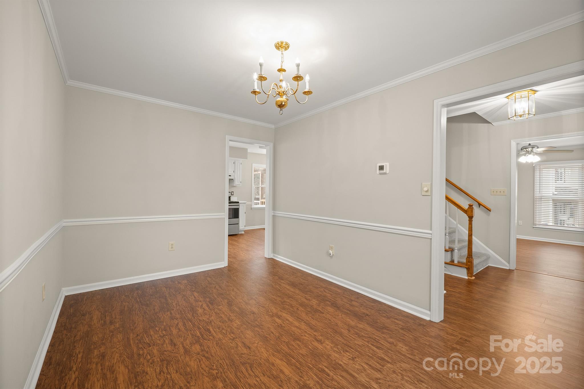 8730 Rittenhouse Circle Charlotte, NC 28270 - Photo 21 of 48 a view of an empty room with wooden floor and a window