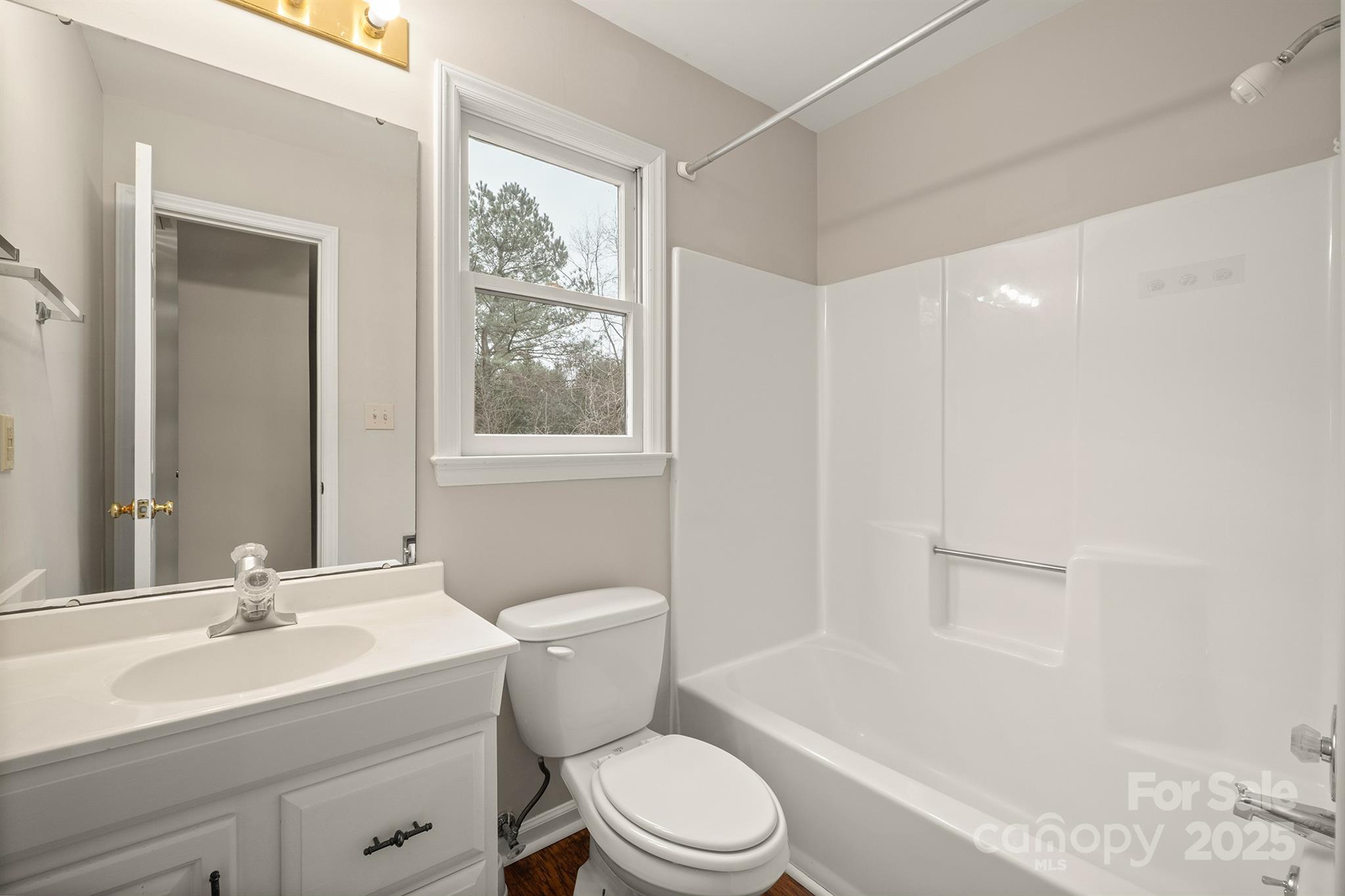 8730 Rittenhouse Circle Charlotte, NC 28270 - Photo 27 of 48 a bathroom with a sink a toilet and shower