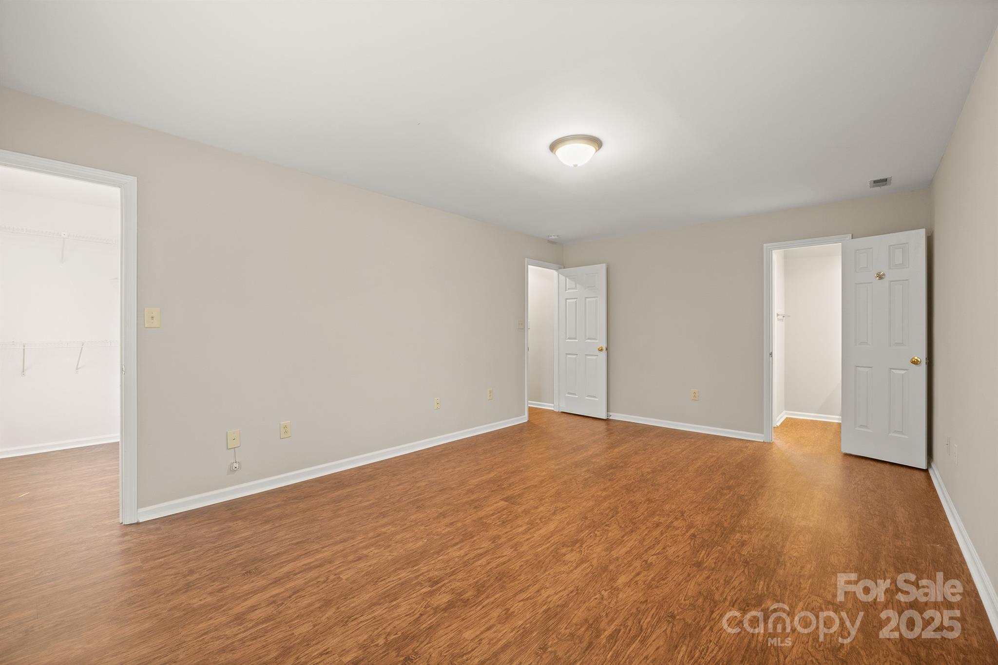 8730 Rittenhouse Circle Charlotte, NC 28270 - Photo 30 of 48 a view of an empty room with wooden floor