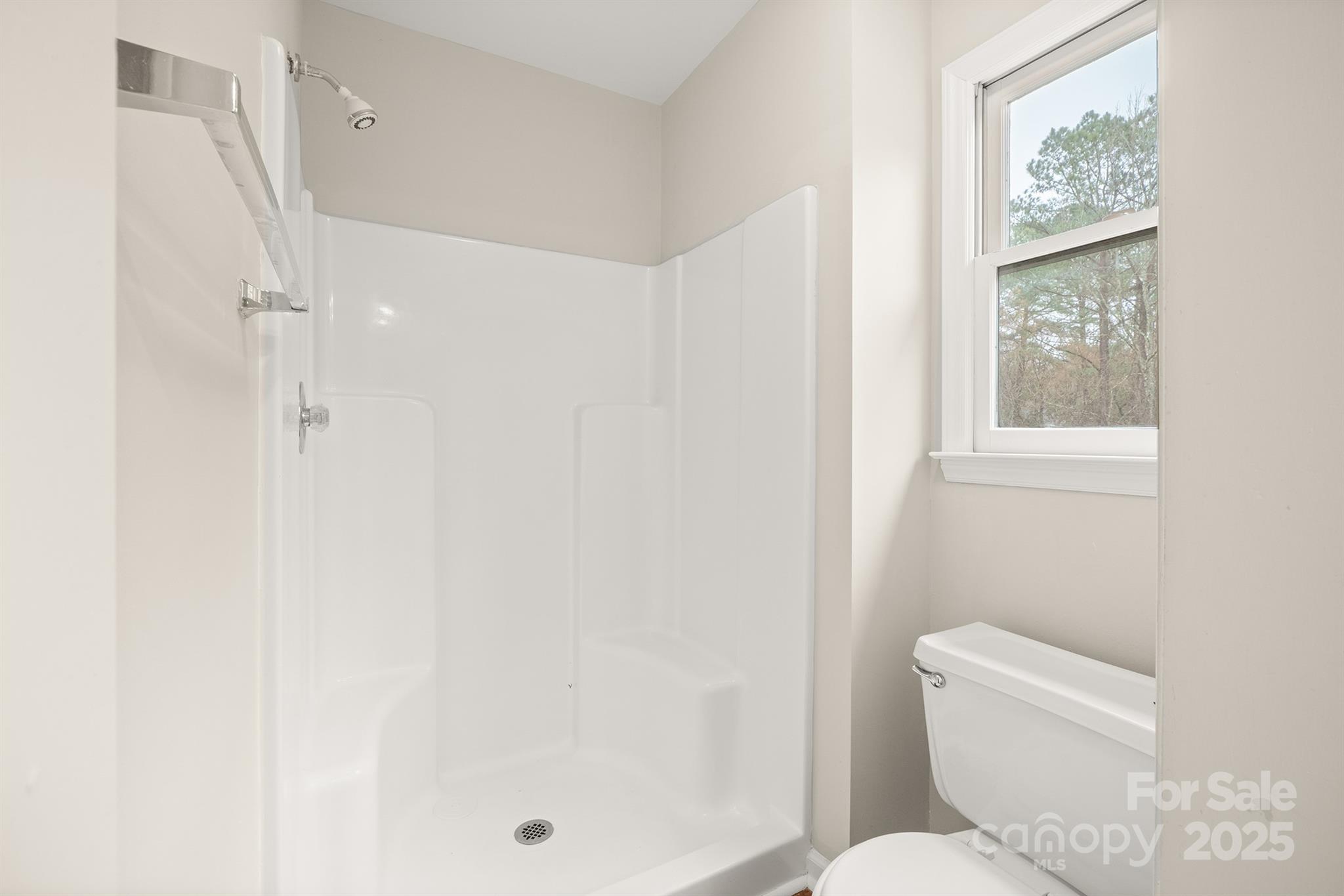 8730 Rittenhouse Circle Charlotte, NC 28270 - Photo 32 of 48 a white toilet sitting next to a bathroom
