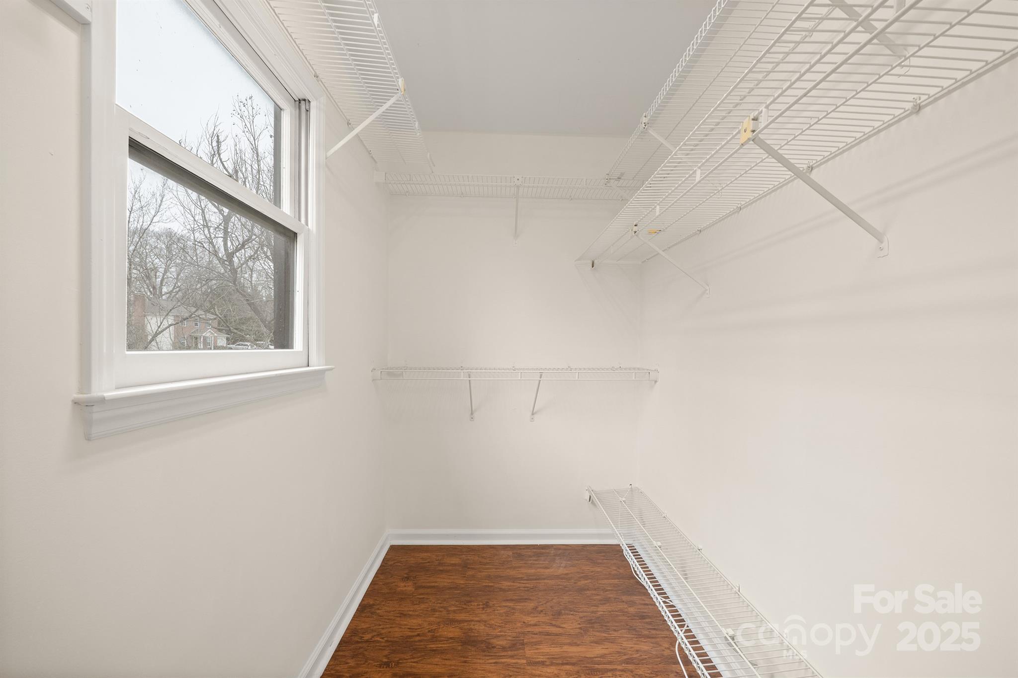 8730 Rittenhouse Circle Charlotte, NC 28270 - Photo 33 of 48 a view of a hallway with wooden floor and a window