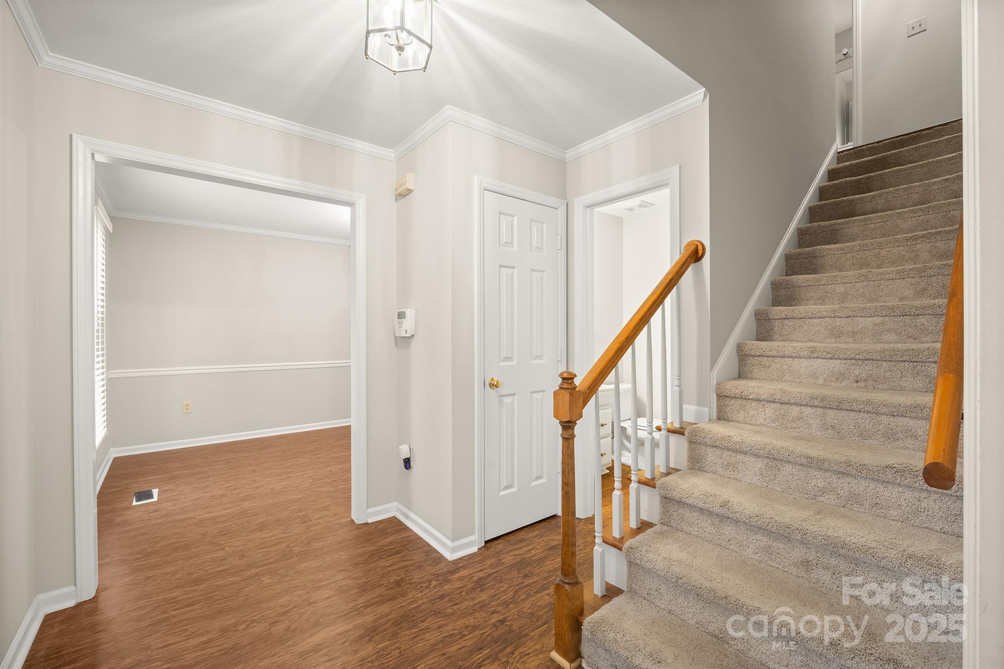 8730 Rittenhouse Circle Charlotte, NC 28270 - Photo 8 of 48 a view of entryway with wooden floor