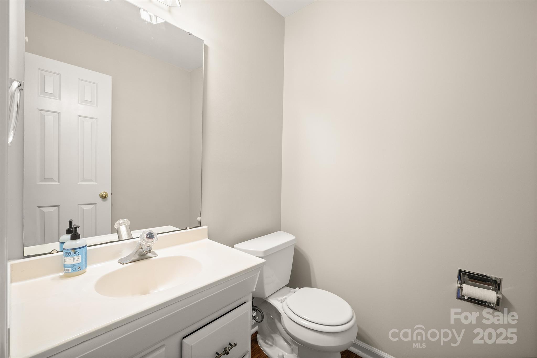 8730 Rittenhouse Circle Charlotte, NC 28270 - Photo 9 of 48 a bathroom with a sink a toilet and mirror