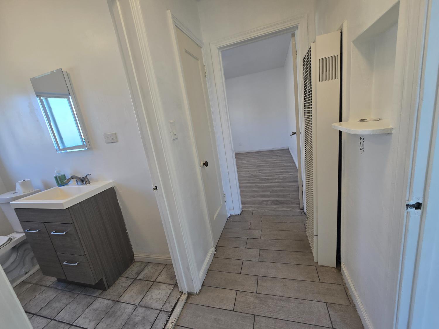 320 North Sanborn Road Salinas, CA 93905 - Photo 18 of 27 a bathroom with a sink and a mirror