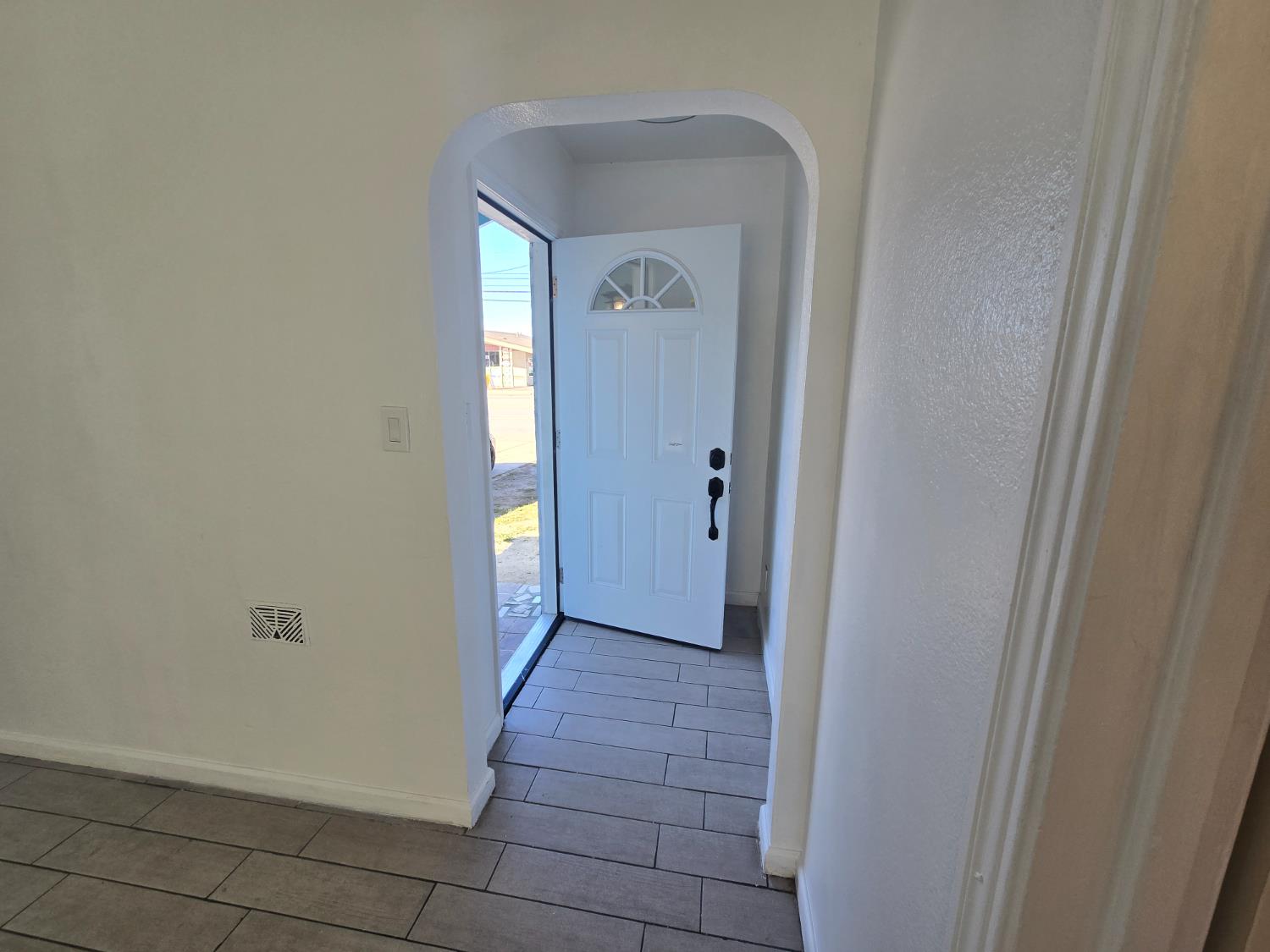 320 North Sanborn Road Salinas, CA 93905 - Photo 3 of 27 a view of a hallway with wooden floor