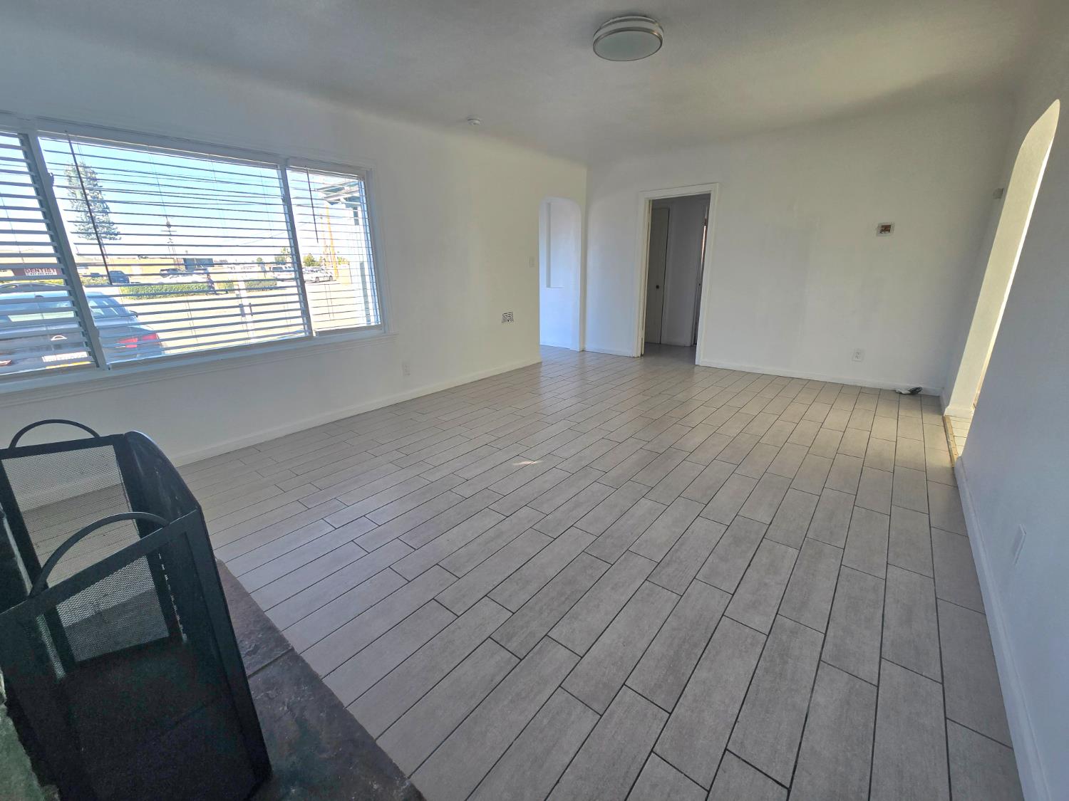 320 North Sanborn Road Salinas, CA 93905 - Photo 9 of 27 a view of a room with wooden floor and windows