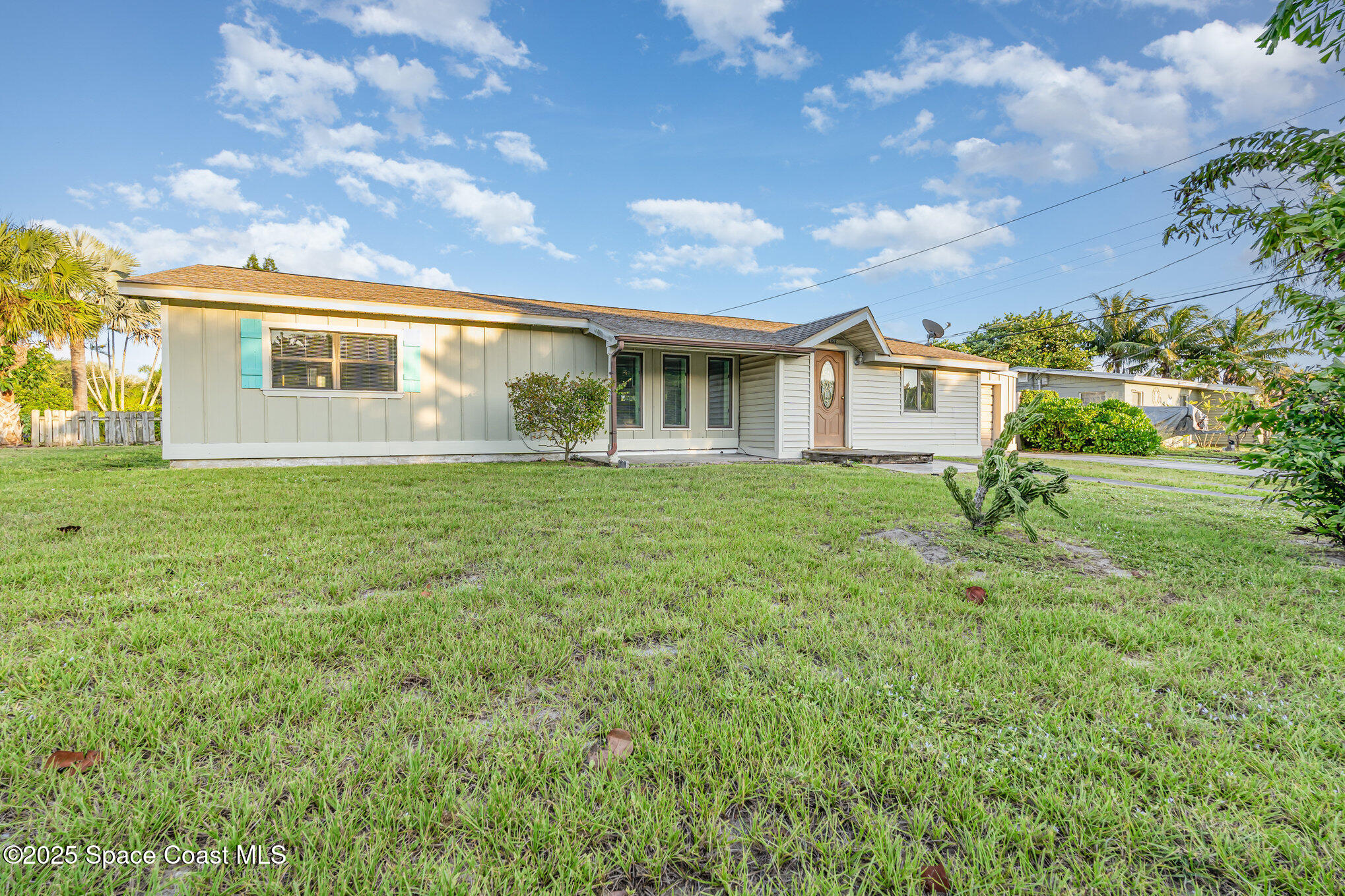 2155 Palm Avenue Indialantic, FL 32903 - Photo 1 of 15 a view of a house with a yard