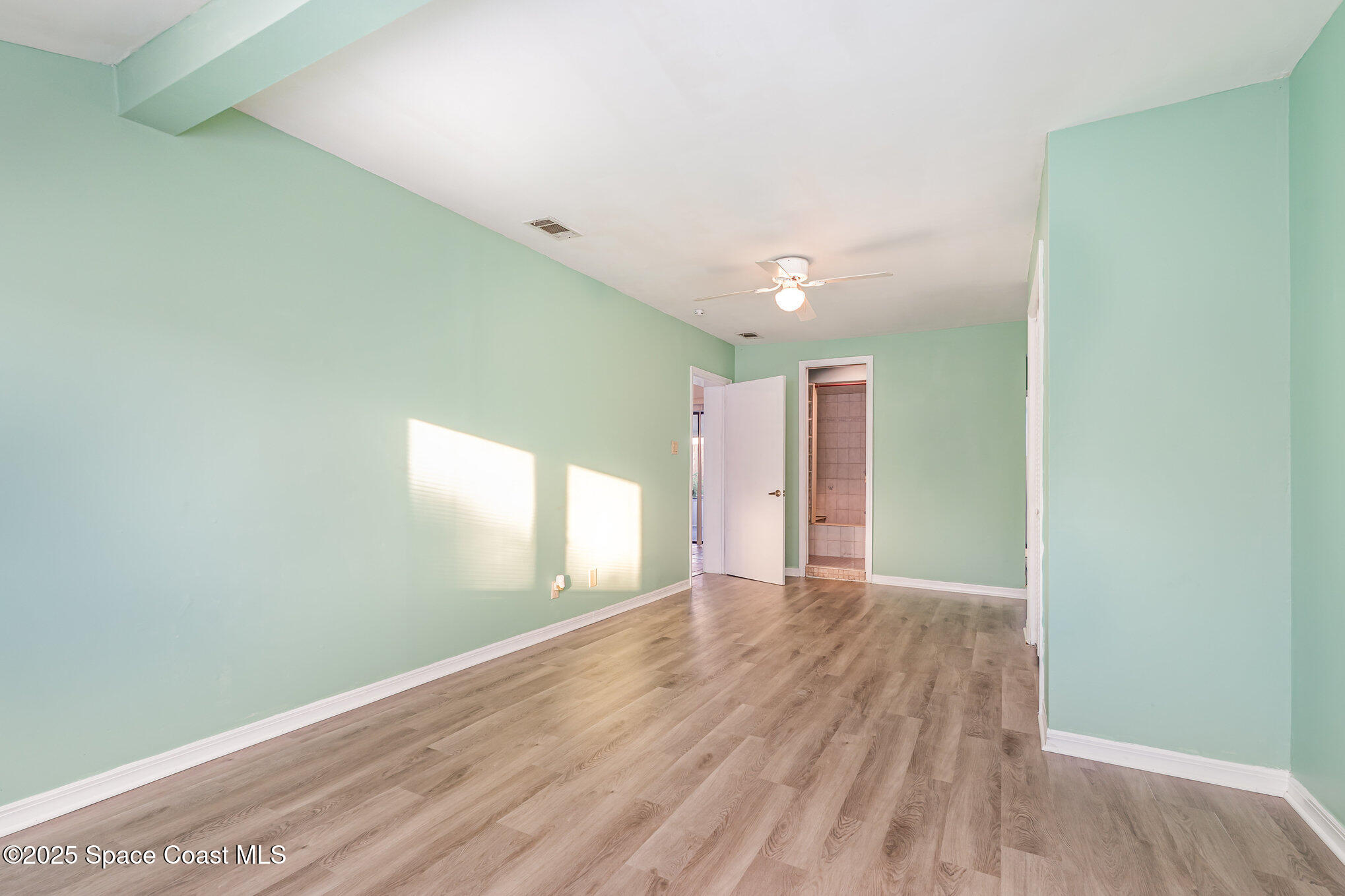 2155 Palm Avenue Indialantic, FL 32903 - Photo 6 of 15 a view of an empty room and window