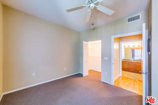 an empty room with a view of an empty room