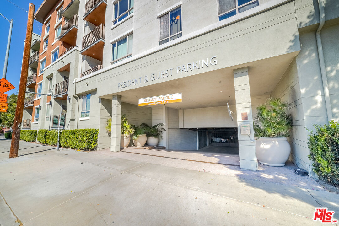 100 South Alameda Street, Unit 154 Los Angeles, CA 90012 - Photo 17 of 25 a view of a building with potted plants