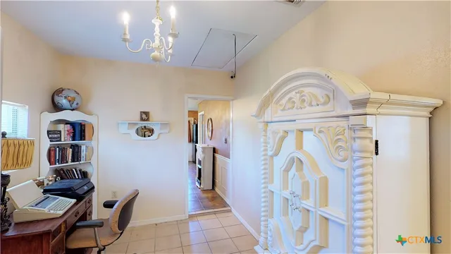 a view of a livingroom with furniture and toys