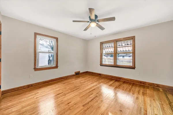 a view of an empty room and window