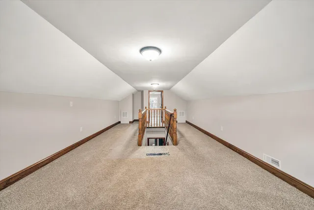 a view of hallway with stairs