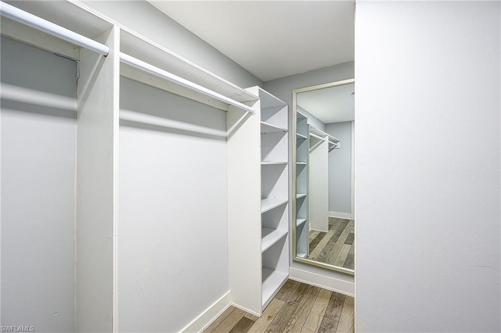 5499 Rattlesnake Hammock Road, Unit 304A Naples, FL 34113 - Photo 20 of 38 a view of an empty walk in closet