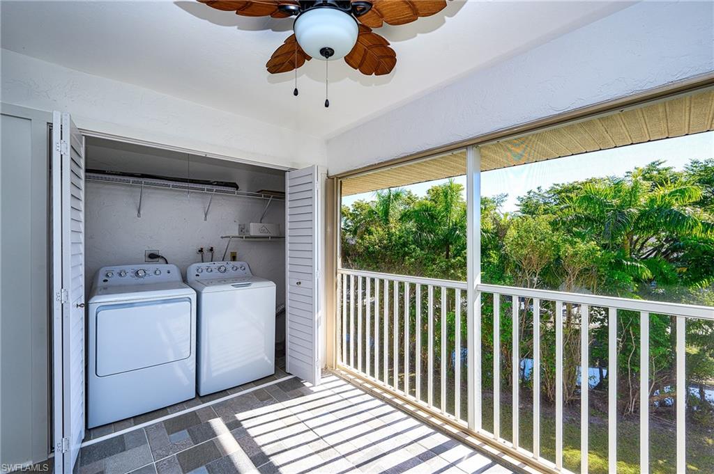 5499 Rattlesnake Hammock Road, Unit 304A Naples, FL 34113 - Photo 3 of 38 a utility room with dryer and washer