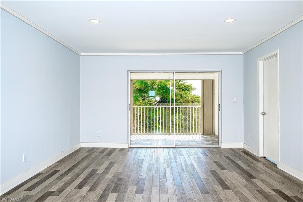 5499 Rattlesnake Hammock Road, Unit 304A Naples, FL 34113 - Photo 8 of 38 wooden floor in a room