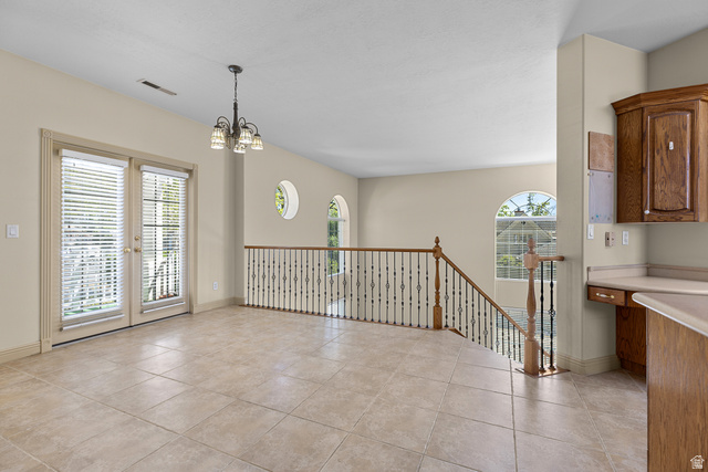 389 North Main Street St. George, UT 84770 - Photo 21 of 44 Unfurnished dining area featuring light tile patterned flooring and hanging lights