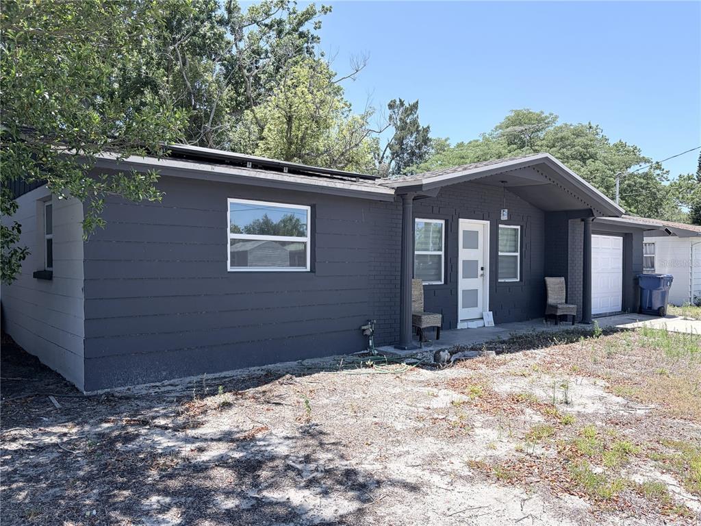 3818 Moog Road Holiday, FL 34691 - Photo 5 of 19 a view of a house with a yard