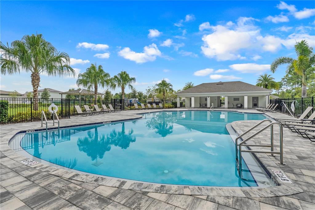 1001 Rivers Crossing Street Clermont, FL 34714 - Photo 39 of 41 a view of swimming pool with outdoor seating and deck