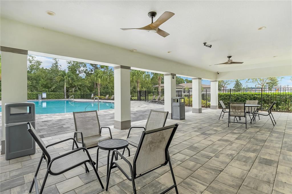 1001 Rivers Crossing Street Clermont, FL 34714 - Photo 40 of 41 a view of a dining room with furniture window and outside view