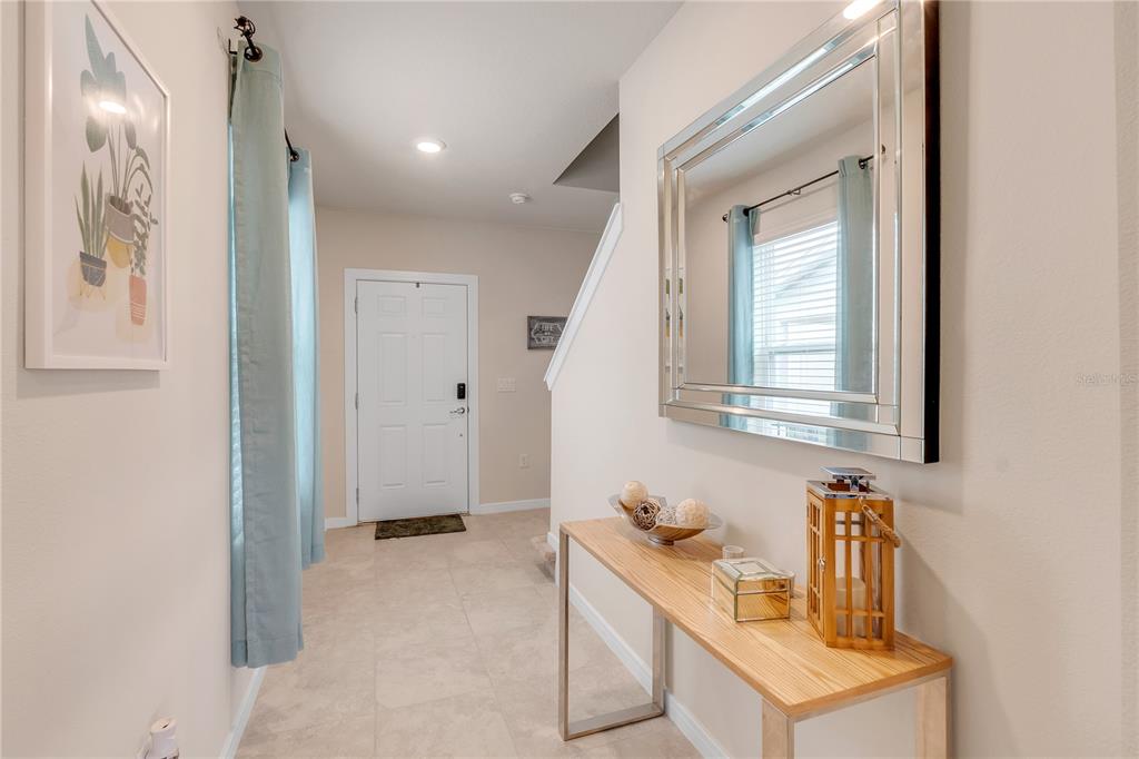 1001 Rivers Crossing Street Clermont, FL 34714 - Photo 9 of 41 a bathroom with a sink and a mirror