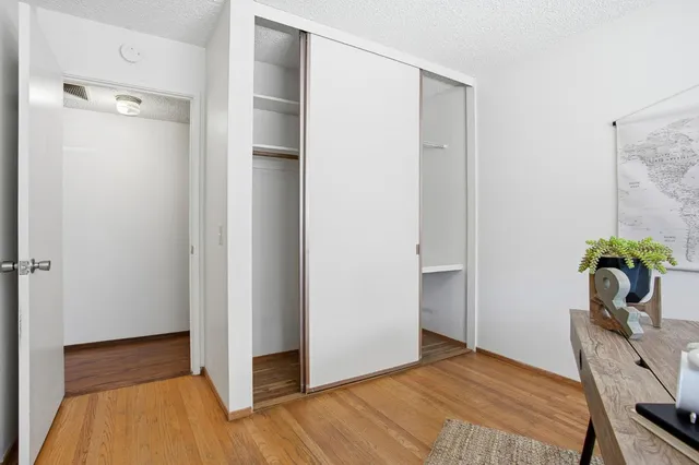 a view of a bedroom from a hallway