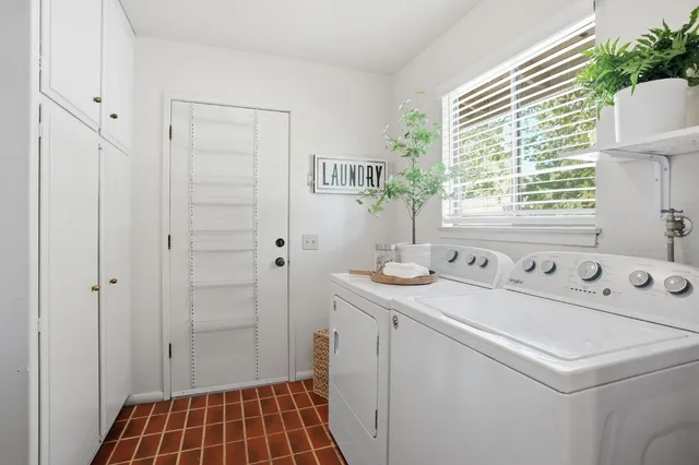 a utility room with dryer and washer