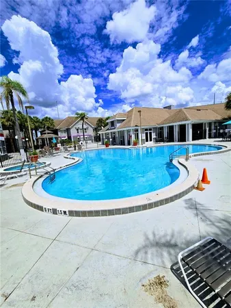 a view of a house with swimming pool
